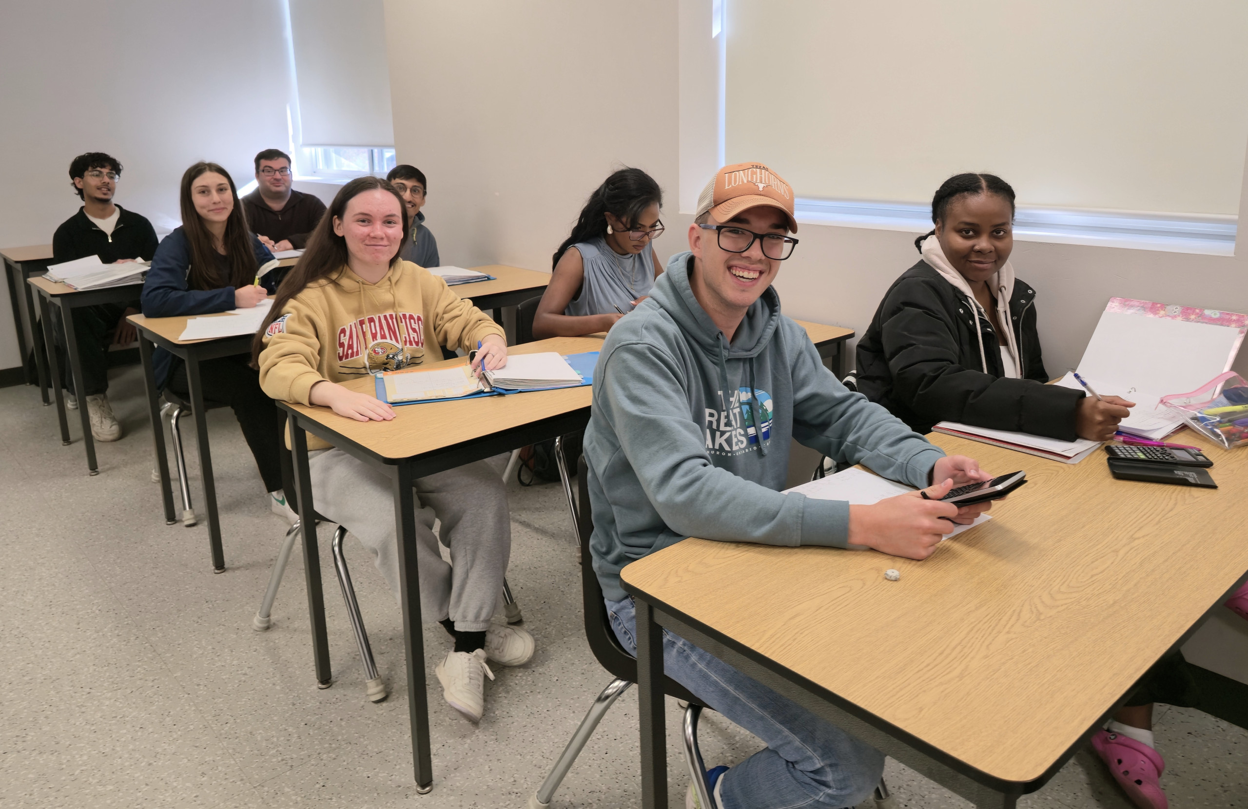 Students seated in pairs at St. Louis