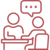 Icon of two people seated at a table having a conversation